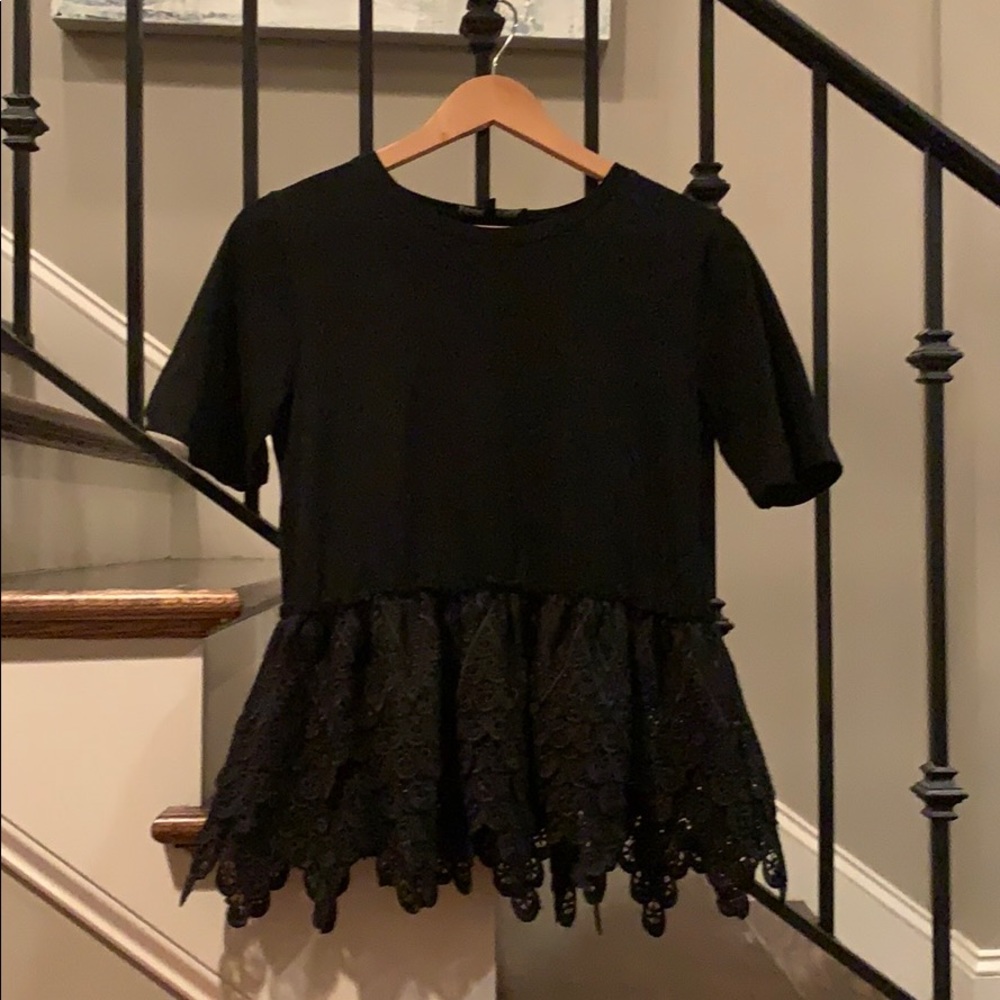 Cute black top with lace ruffle